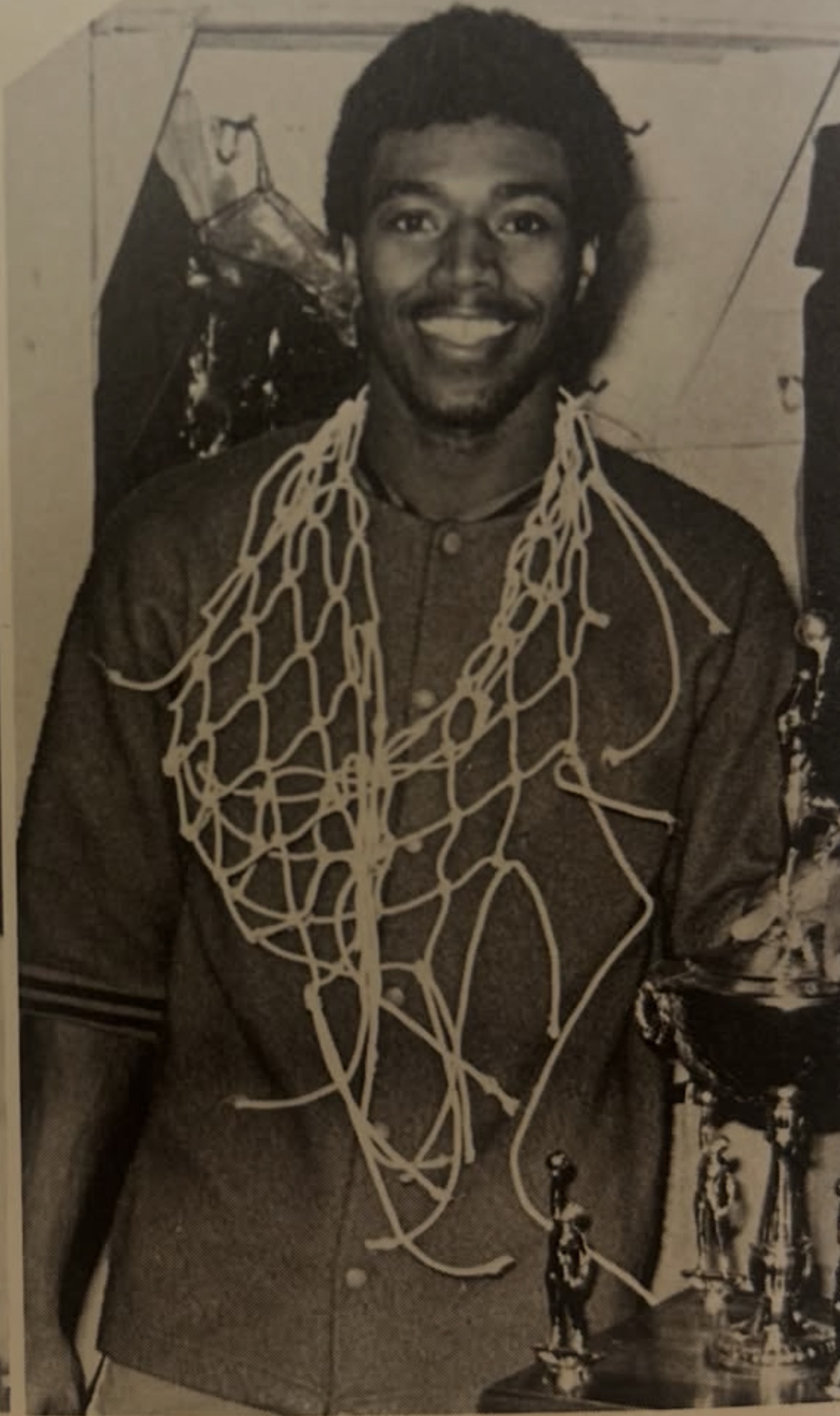 John Duren as a young player, wearing a championship net after winning a title